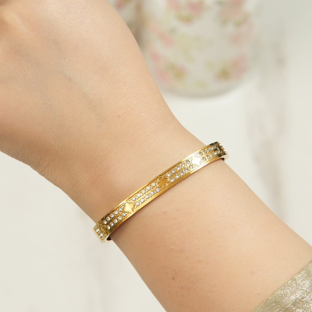 Elegant 18K gold plated zirconia bangle designed for sophisticated women in the UAE, offering a refined everyday luxury look with timeless sparkle and premium craftsmanship.