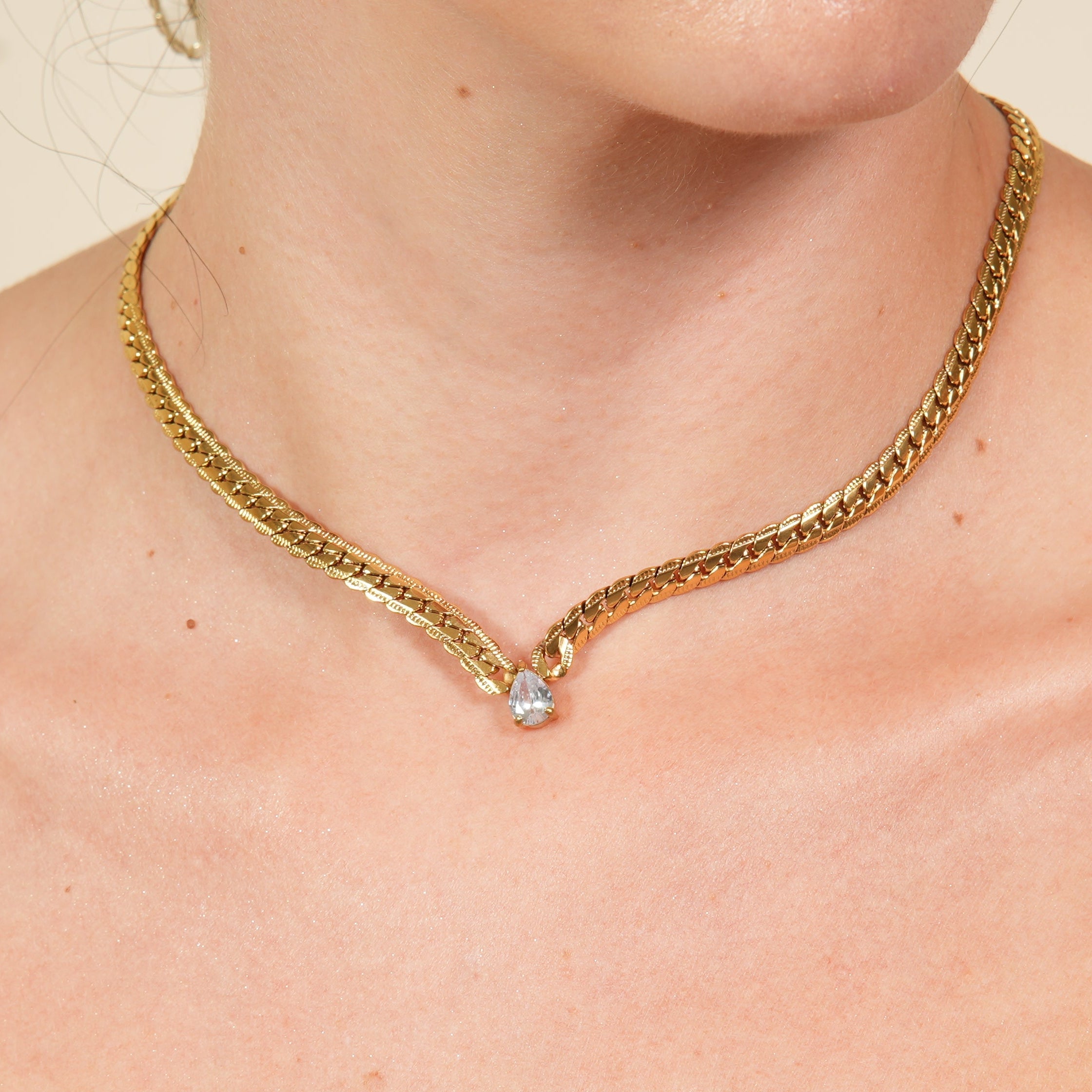 Amya blue teardrop pendant necklace with cubic zirconia, an elegant ceremony jewellery piece designed to add graceful sparkle for women.