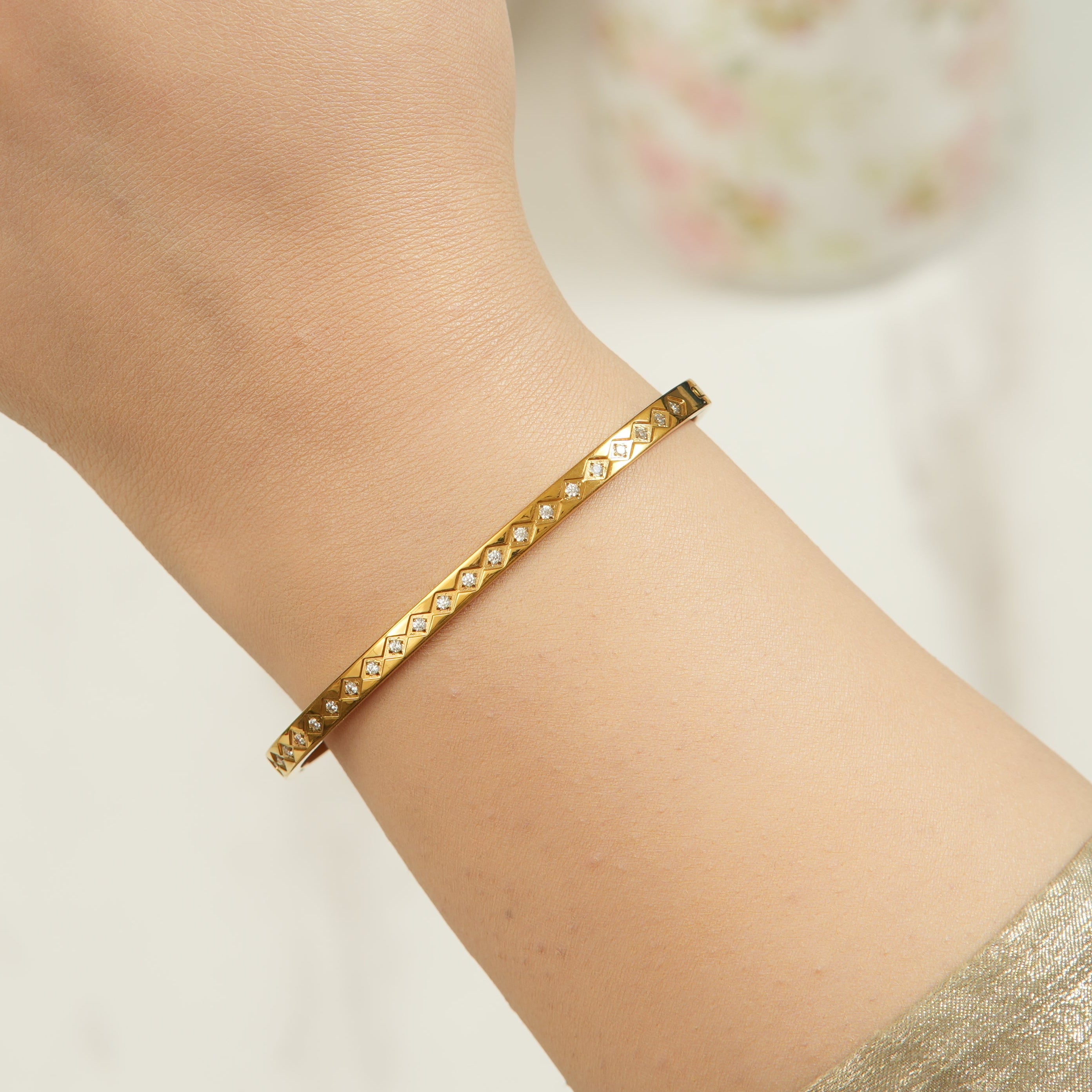 Bana geometric web cuff bangle with an 18K gold-plated look, designed for women who love statement jewellery that feels modern, artistic, and luxurious.