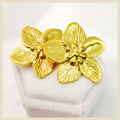 Beja floral dangle earrings for women, a trendy flower statement pair that adds graceful movement and premium elegance to UAE styling.