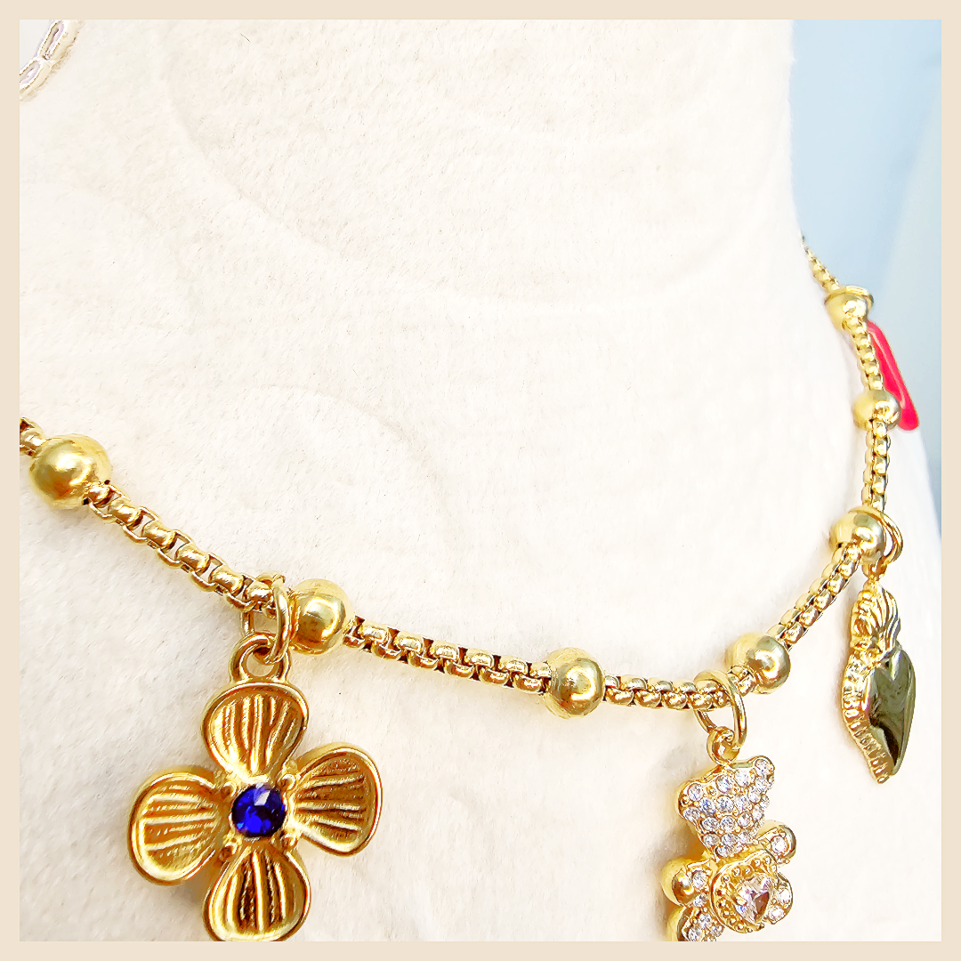 Biri boho chic layered charm necklace designed for travel, beach days, and special moments, bringing relaxed glamour and feminine sophistication.