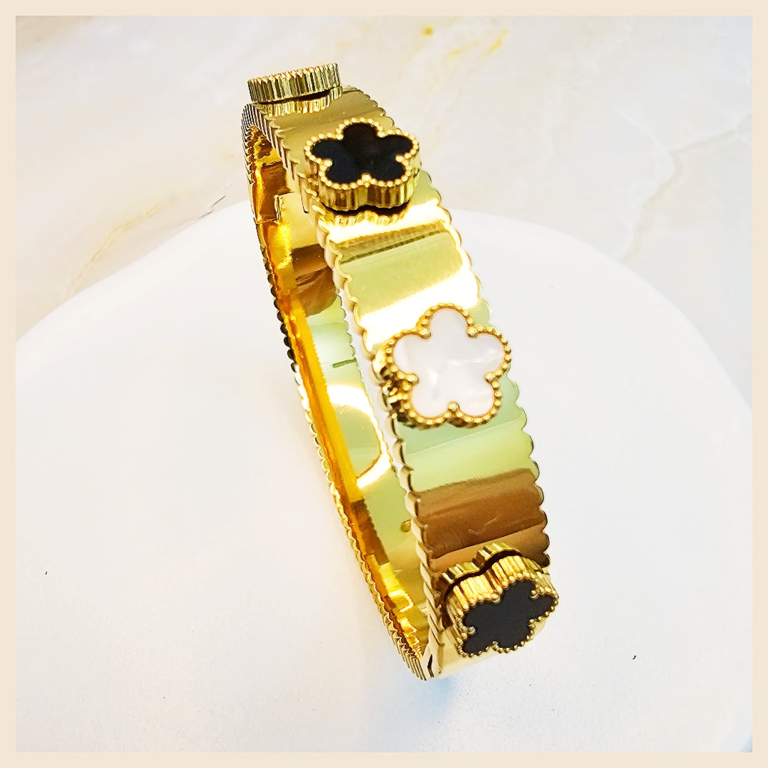 Bridal-ready Keia petal clover crystal bangle in 18K gold-plated style, ideal for weddings, engagement parties, and elegant photo moments.