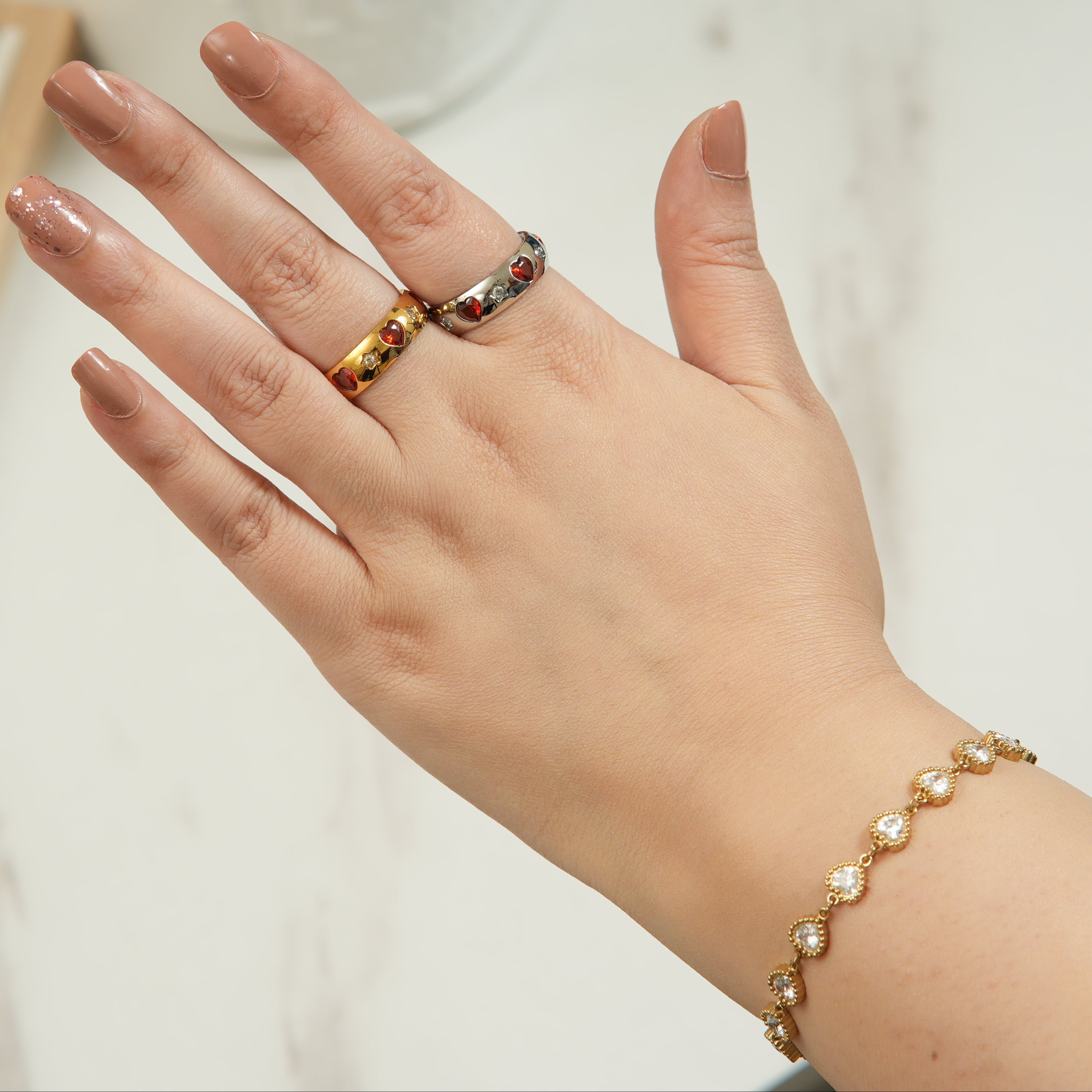 Cari red heart ring with cubic zirconia for women, a romantic wedding band style that adds bold elegance and confident sparkle for bridal moments in the UAE.