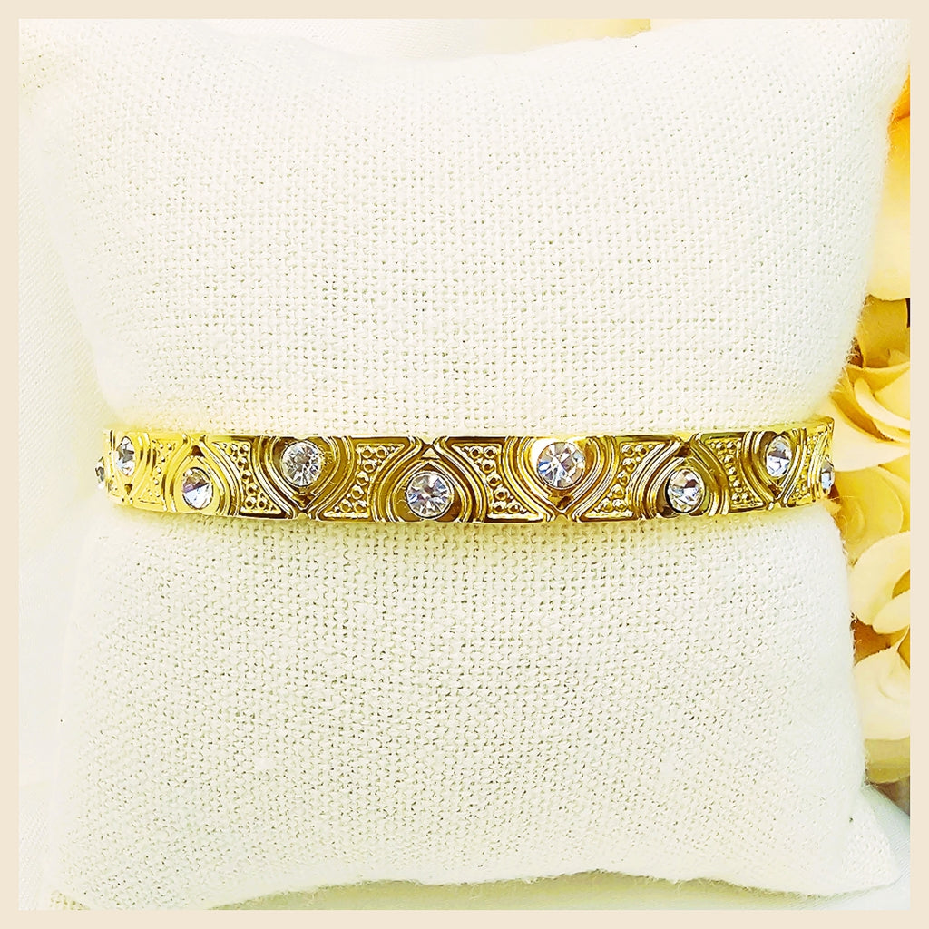Chunky gold enamel bangles made for stacking, perfect for women who enjoy bold style balanced with premium elegance.