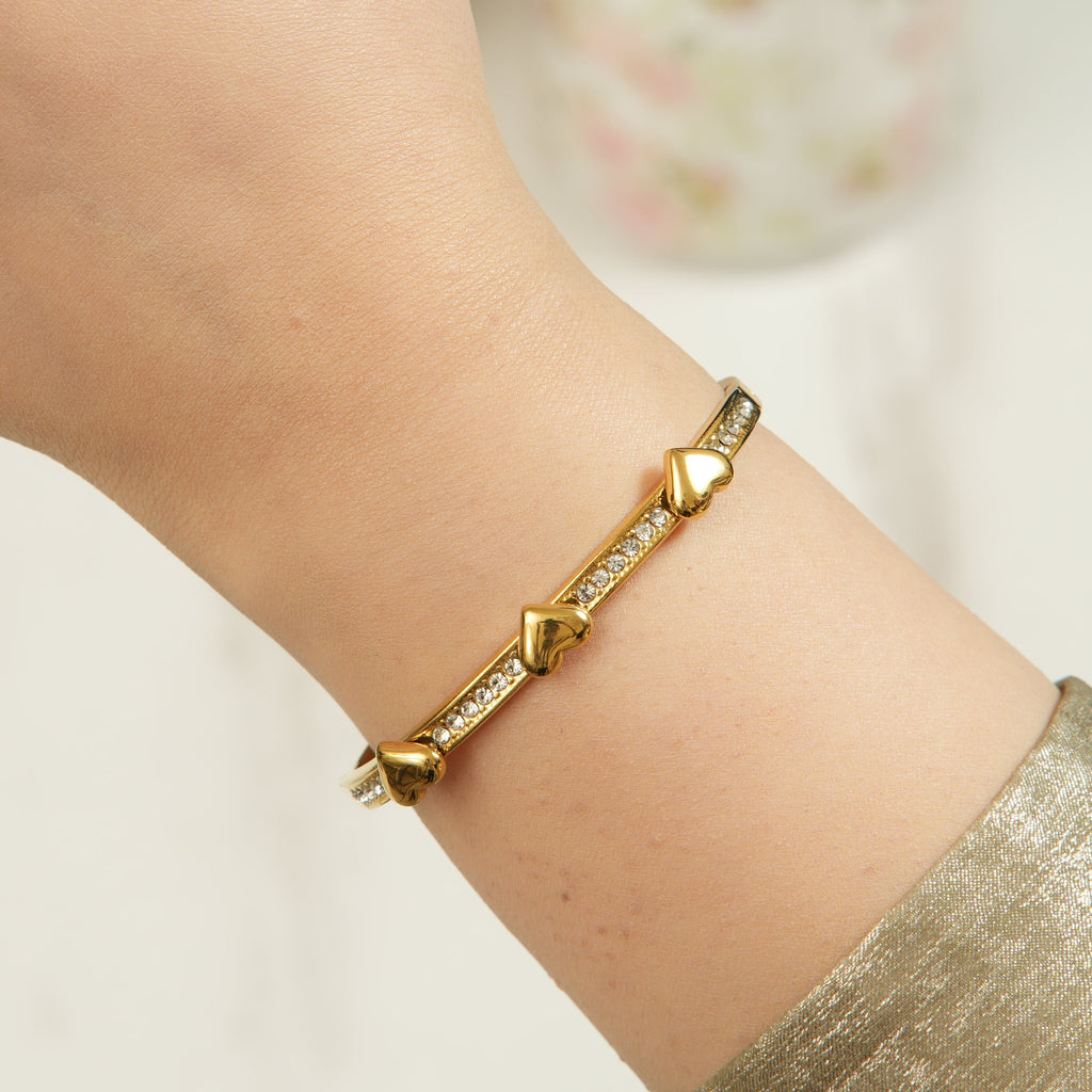 Cloisonné floral bangle in gold plating, radiating artistic charm and premium polish for women in the UAE who desire exclusive, statement jewellery.