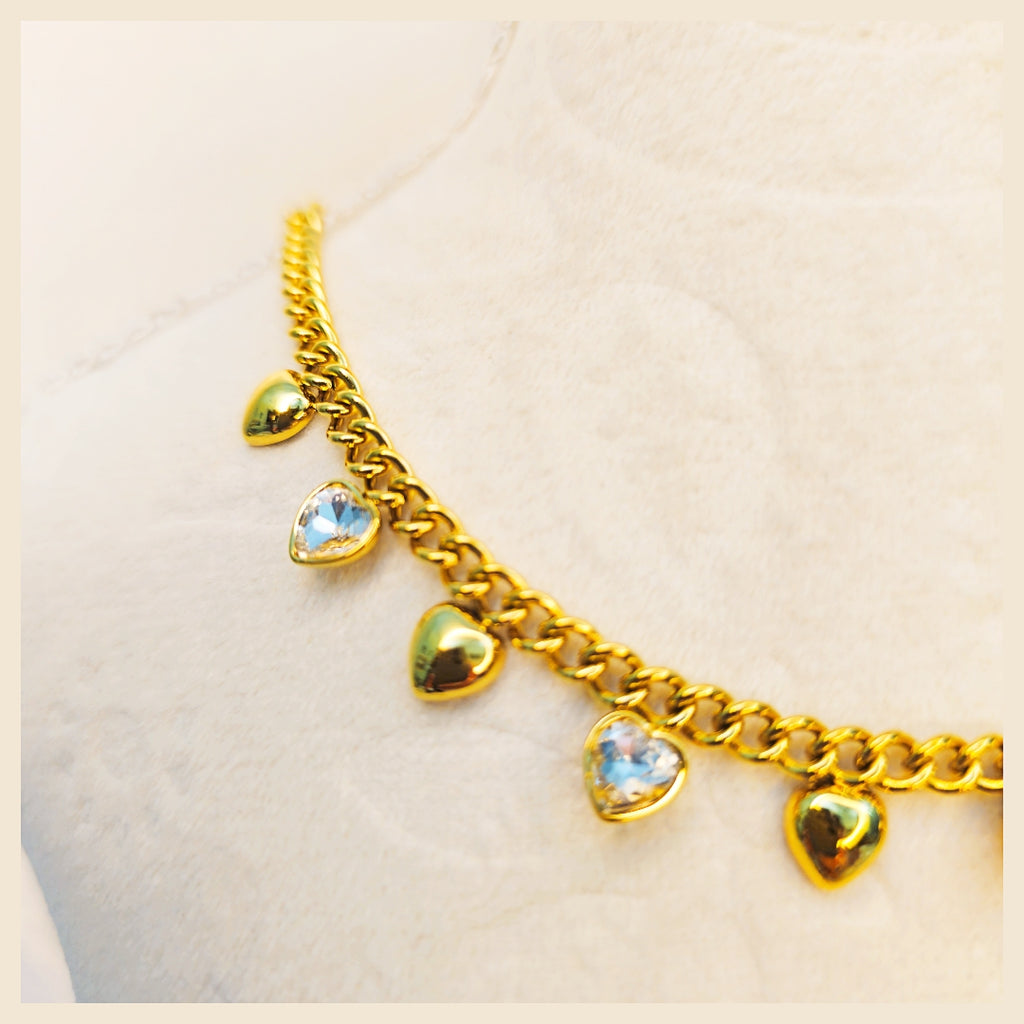 Small gold heart pendant necklace offering timeless charm and subtle brilliance, perfect for women who value quality craftsmanship and meaningful jewellery.