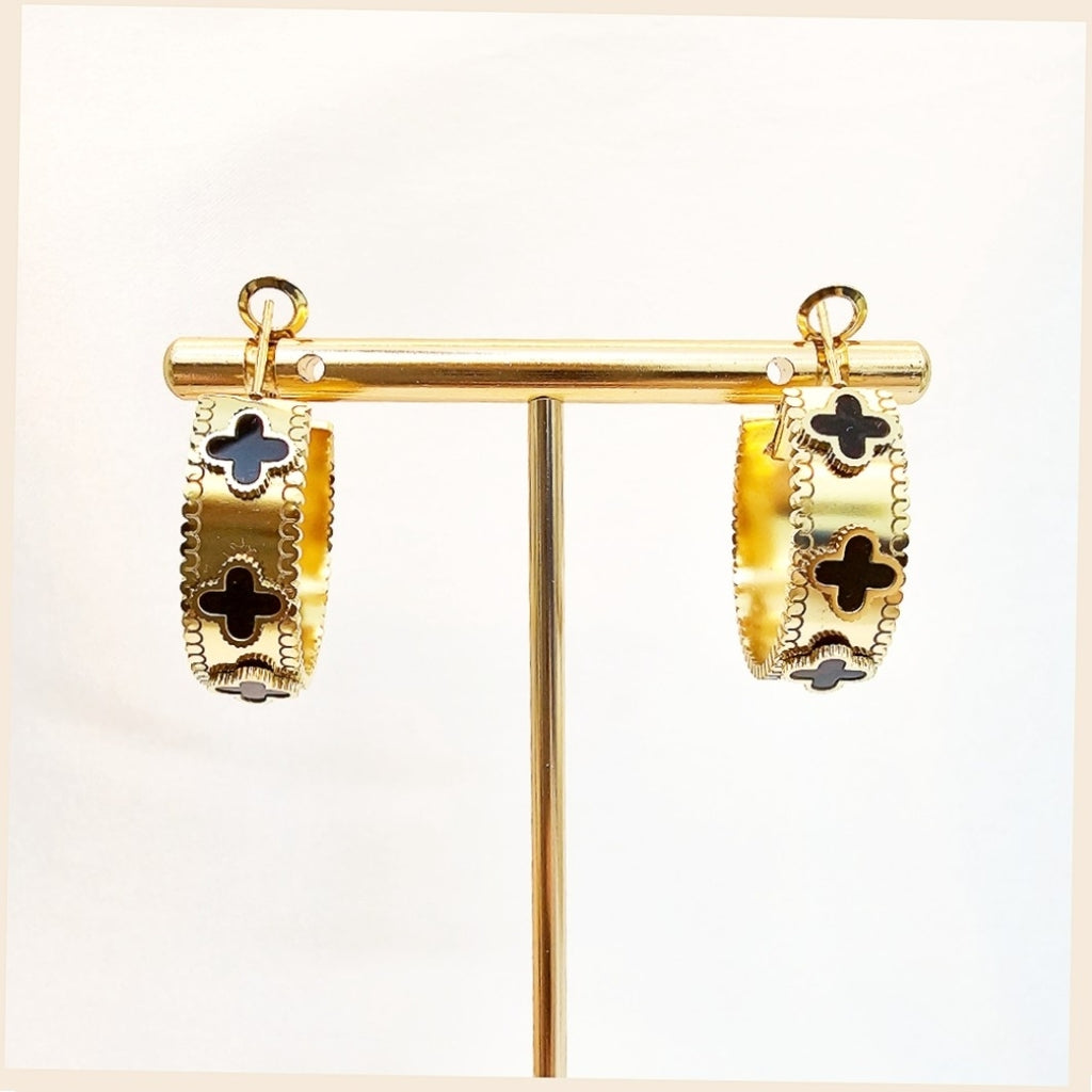 Dana delicate clover hoop earrings with crystal and heart zircon accents, ideal for everyday luxury wear with a soft, confident glow.
