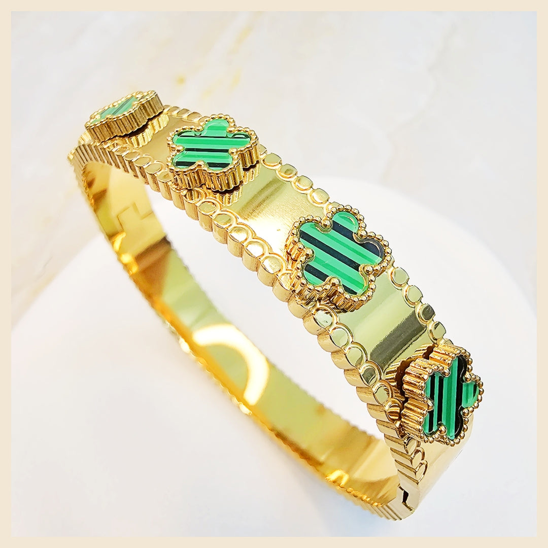 Designer 18K gold-plated crystal bracelet with an openable closure, created to elevate confidence with a clean, premium finish.