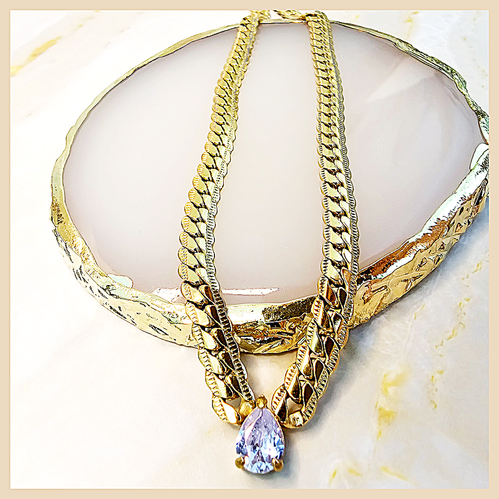 Designer Amya blue teardrop cubic zirconia necklace, a ceremony-ready piece that radiates confidence, luxury, and modern femininity.