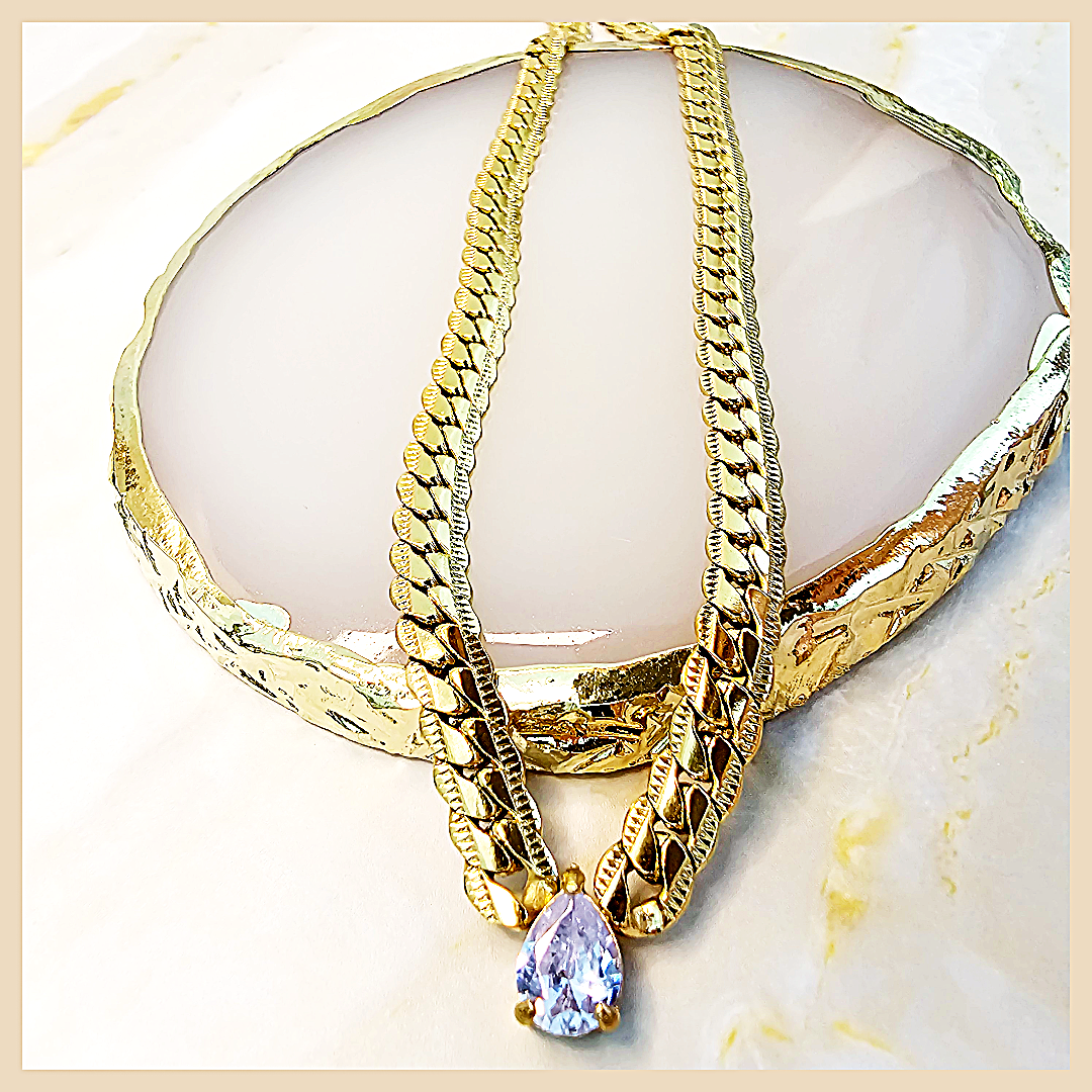 Designer Amya blue teardrop cubic zirconia necklace, a ceremony-ready piece that radiates confidence, luxury, and modern femininity.