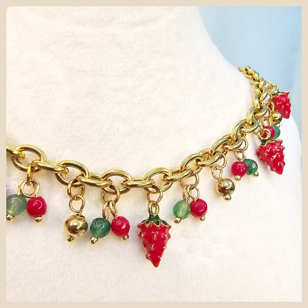 Designer gold plated strawberry necklace, a perfect Eid or special occasion gift that reflects love, luxury and feminine beauty.