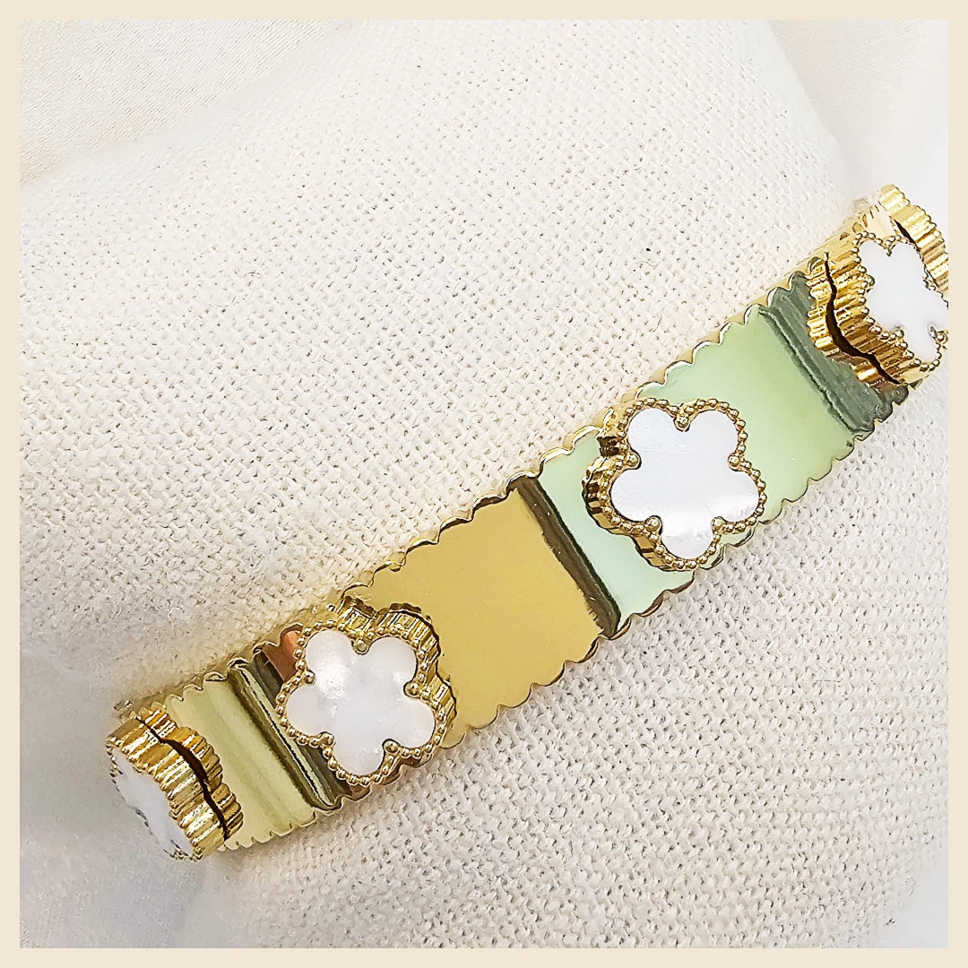 Designer Keia petal clover 18K gold-plated crystal bangle, a sophisticated statement piece that adds confidence and timeless elegance.