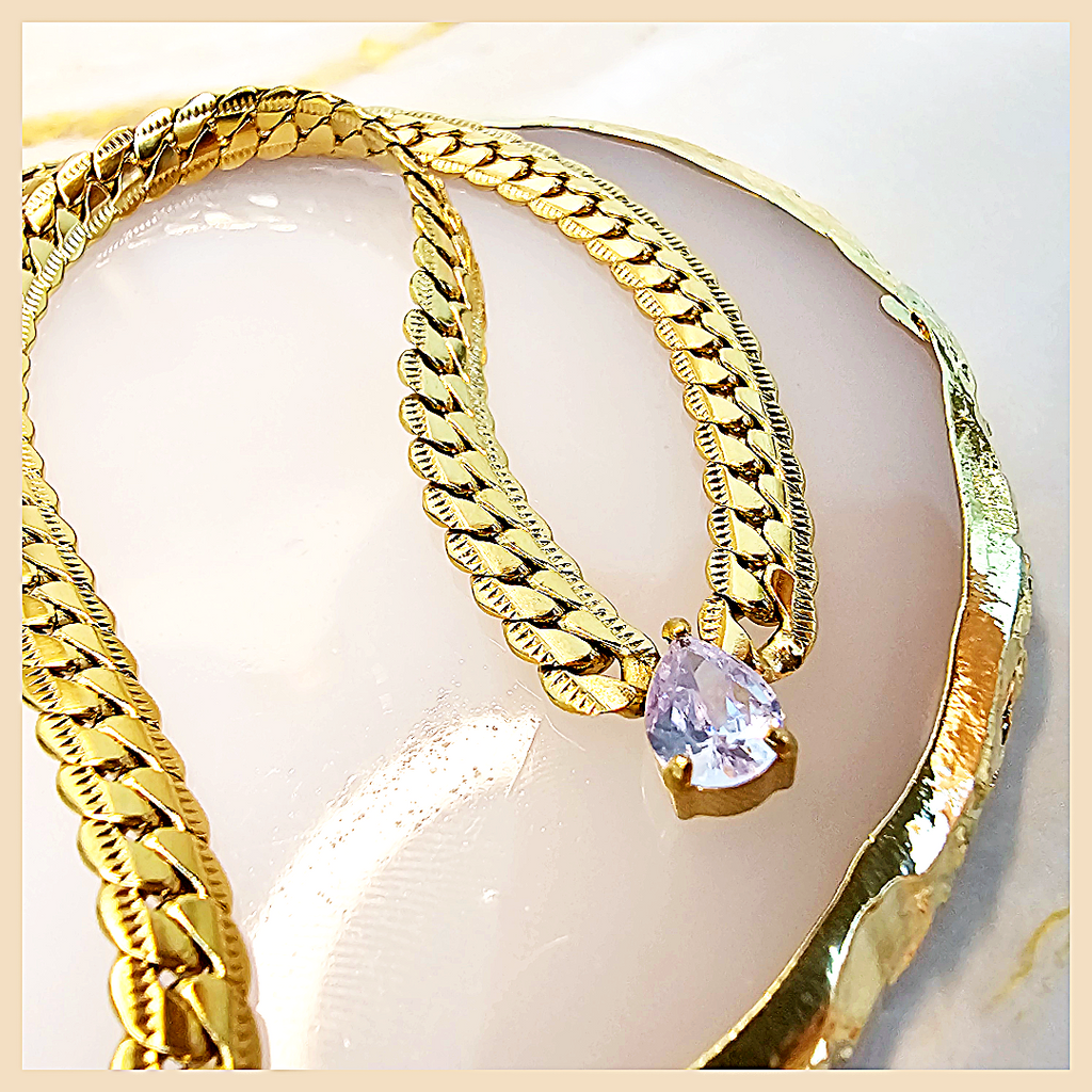Elegant Amya teardrop pendant necklace with blue zirconia, a gift-ready piece that feels romantic and beautifully suited for special moments.