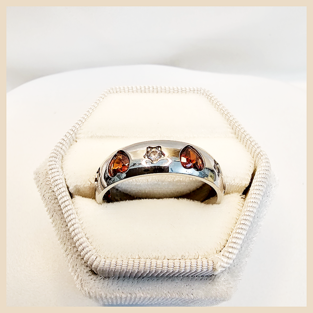 Elegant Cari red heart ring as a bridal accessory, a graceful fashion ring for her that brings passion, beauty, and premium shine to the hand.