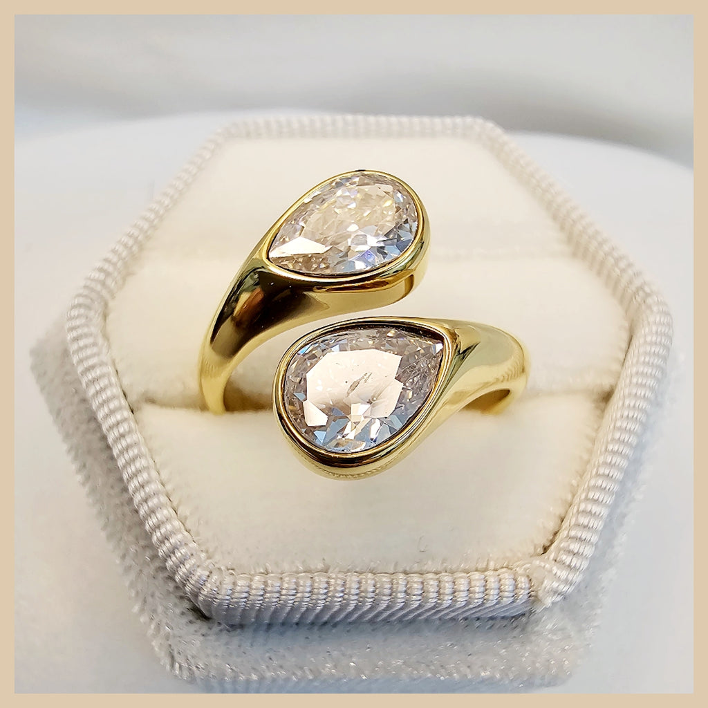 Elegant Huna double drop zircon ring in sterling silver, a festival and celebration gift that makes her feel special with every sparkling detail.