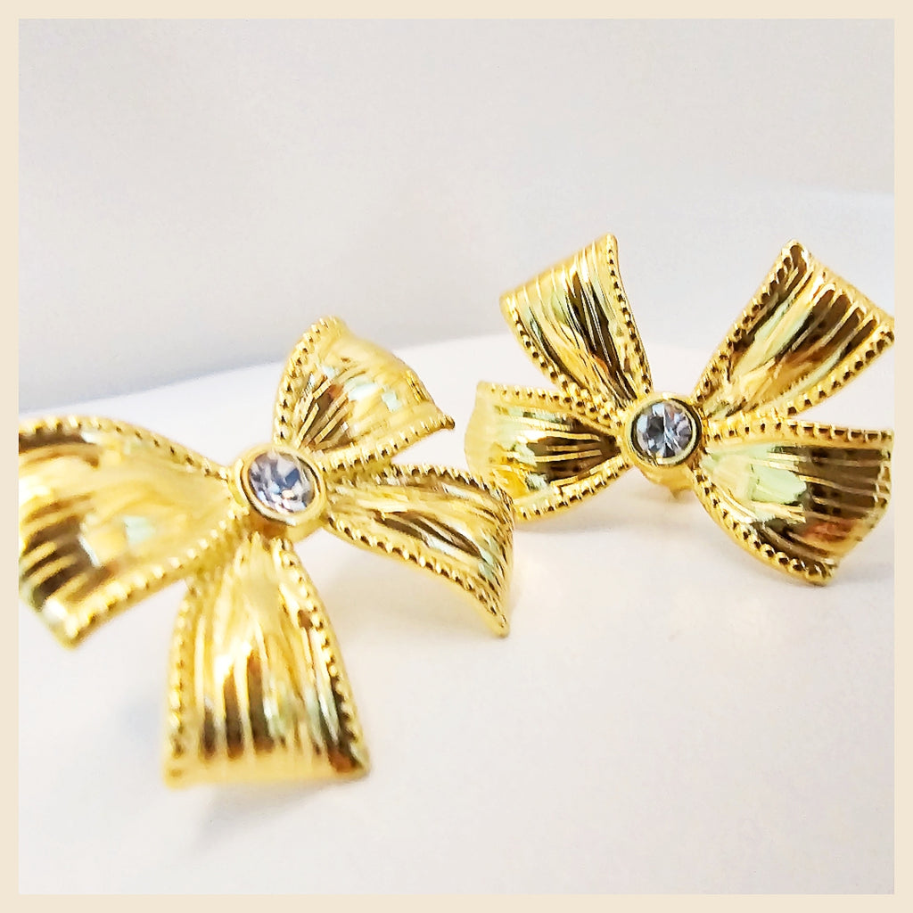 Elegant Lala bow drop earrings in silver crystal style, a beautiful jewellery gift for her that feels romantic, modern, and effortlessly chic.