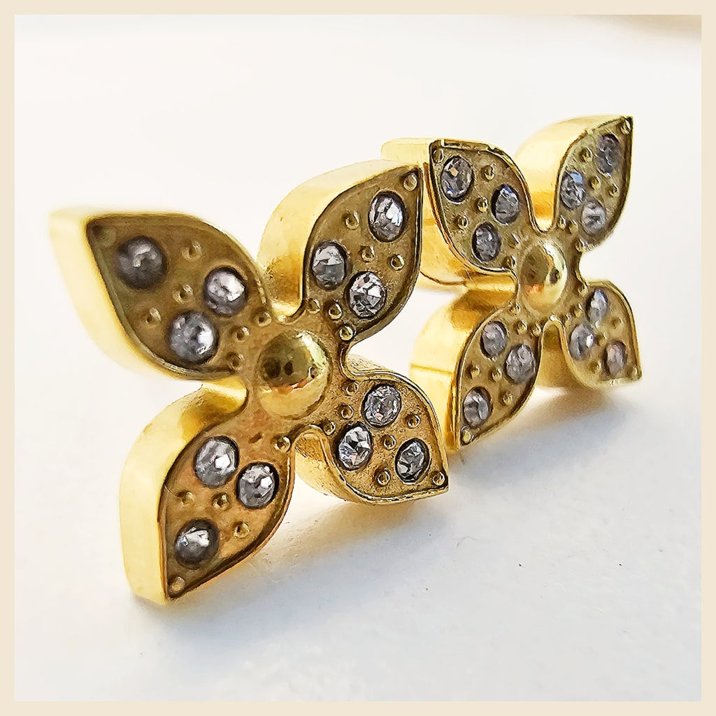 Elegant Liya clover stud earrings with crystal detail, a gift-ready pair for women who love delicate luxury and polished everyday beauty.