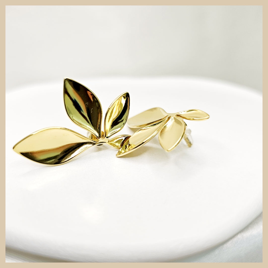 Enna small butterfly flower half hoop earrings, perfect for women who want daily luxury jewellery with a soft romantic touch and easy wearability.
