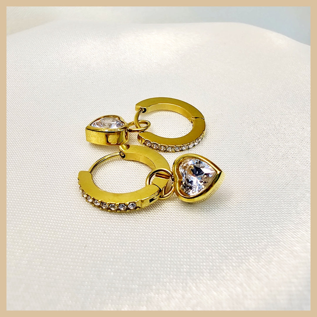 Fari Era 18K gold statement earrings designed to deliver bold elegance and confident luxury for women with refined taste in the UAE.