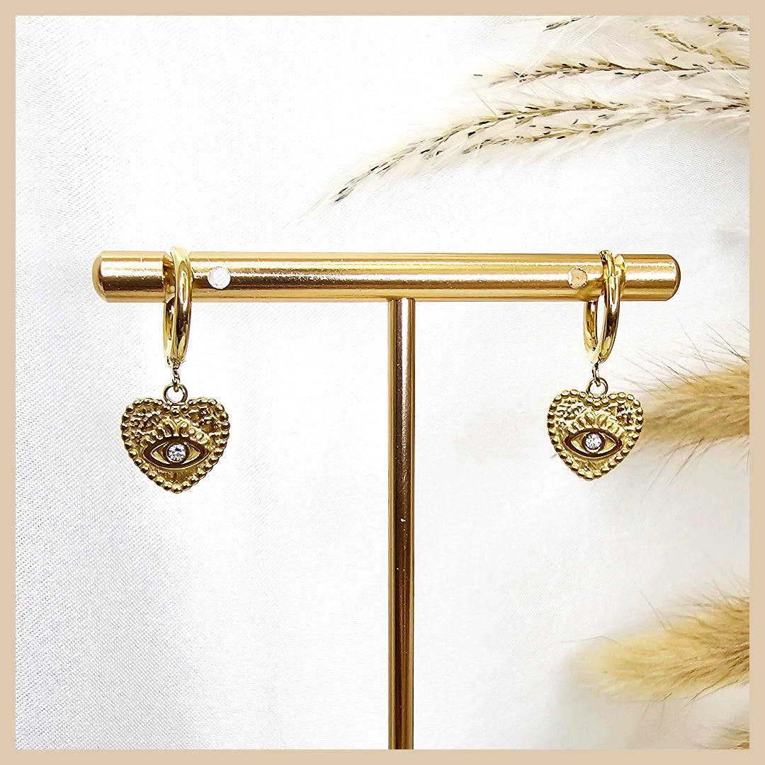 Floral heart bar drop earrings in mixed gold and silver, blending soft botanicals with contemporary polish for an elegant, feminine statement.