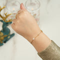 Fola clover bracelet in 18K gold-plated stainless steel with an openable crystal design, a refined luxury piece for women who want elegant sparkle in the UAE.