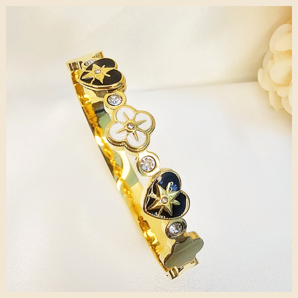 Luxury four leaf clover bracelet with gold plating symbolizing luck and style