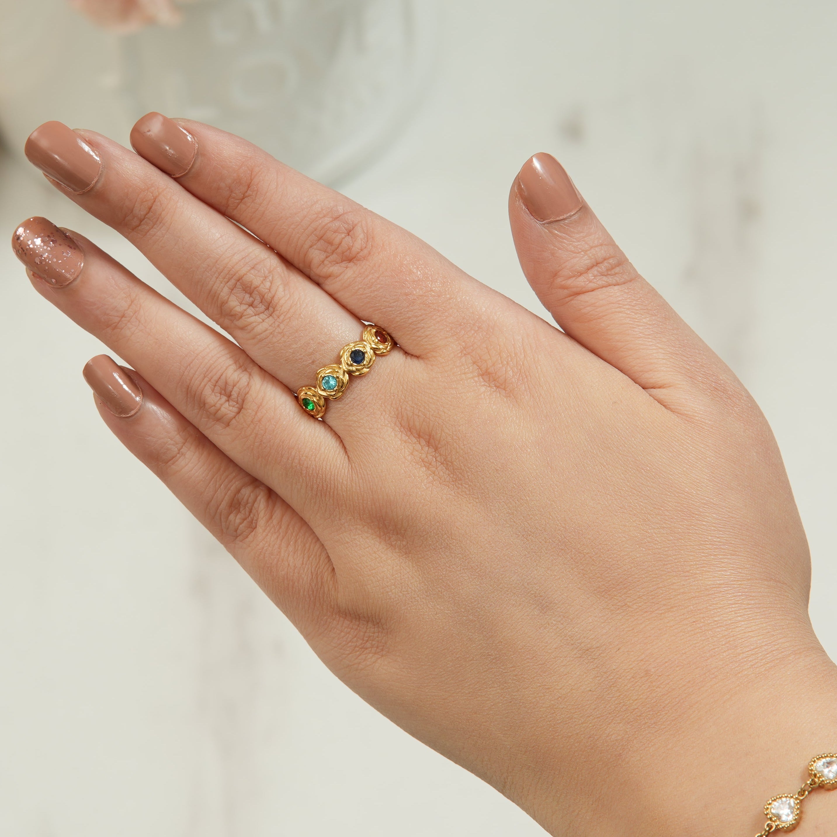 Ilse rainbow star and moon ring in 18K rose gold-plated finish, a dainty women’s piece that adds playful color and elegant charm to everyday luxury.