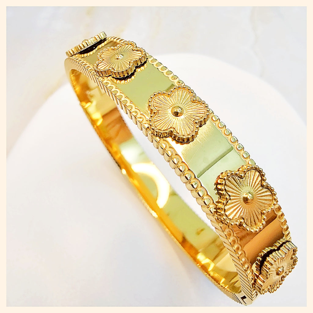 Kate Deep Petal Clover bangle in 18K gold-plated finish with an openable crystal design, a refined luxury bracelet for women who love elegant shine in the UAE.