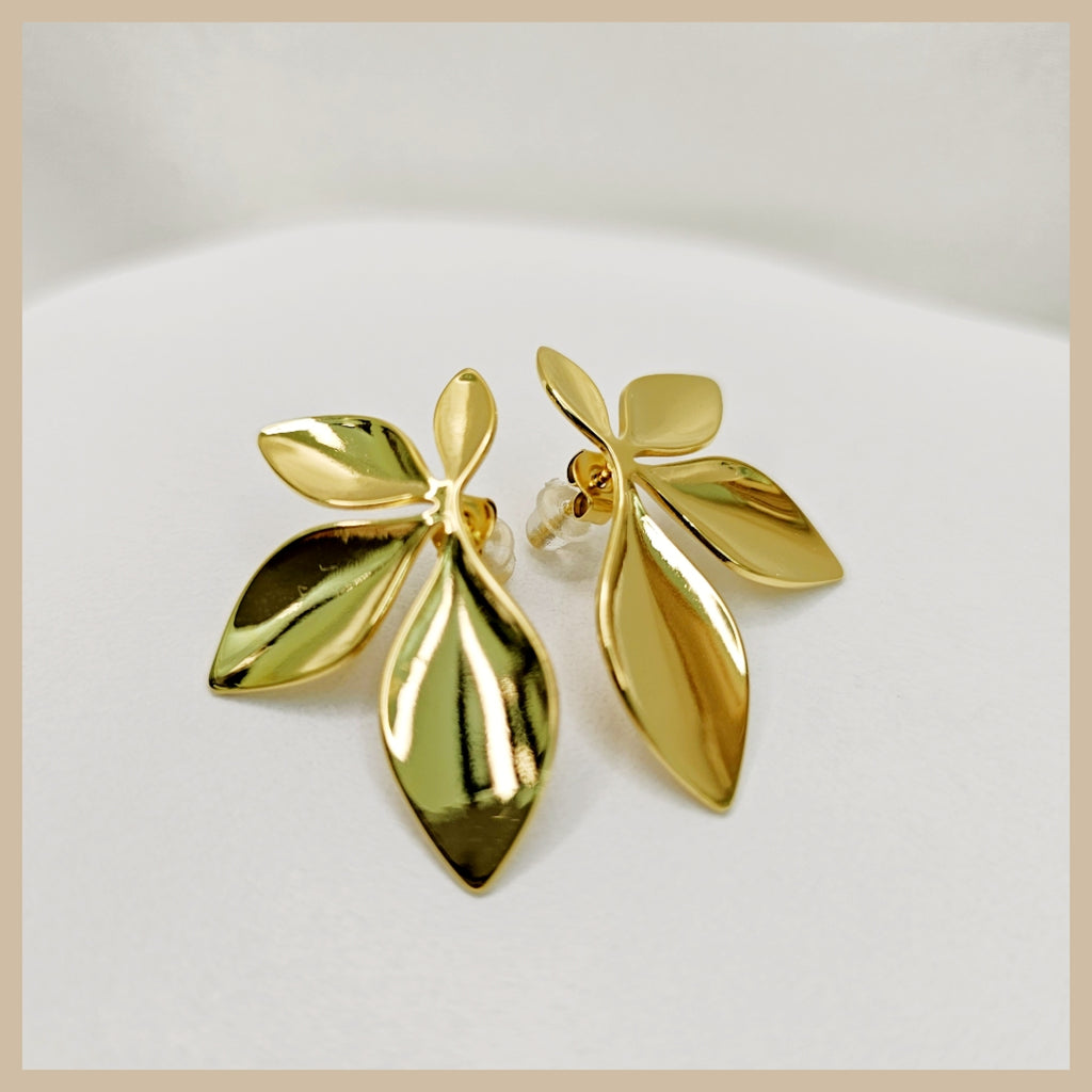 Korean-style Enna half flower earrings for women, designed with a delicate petal look that adds polished beauty and subtle sparkle to everyday outfits.