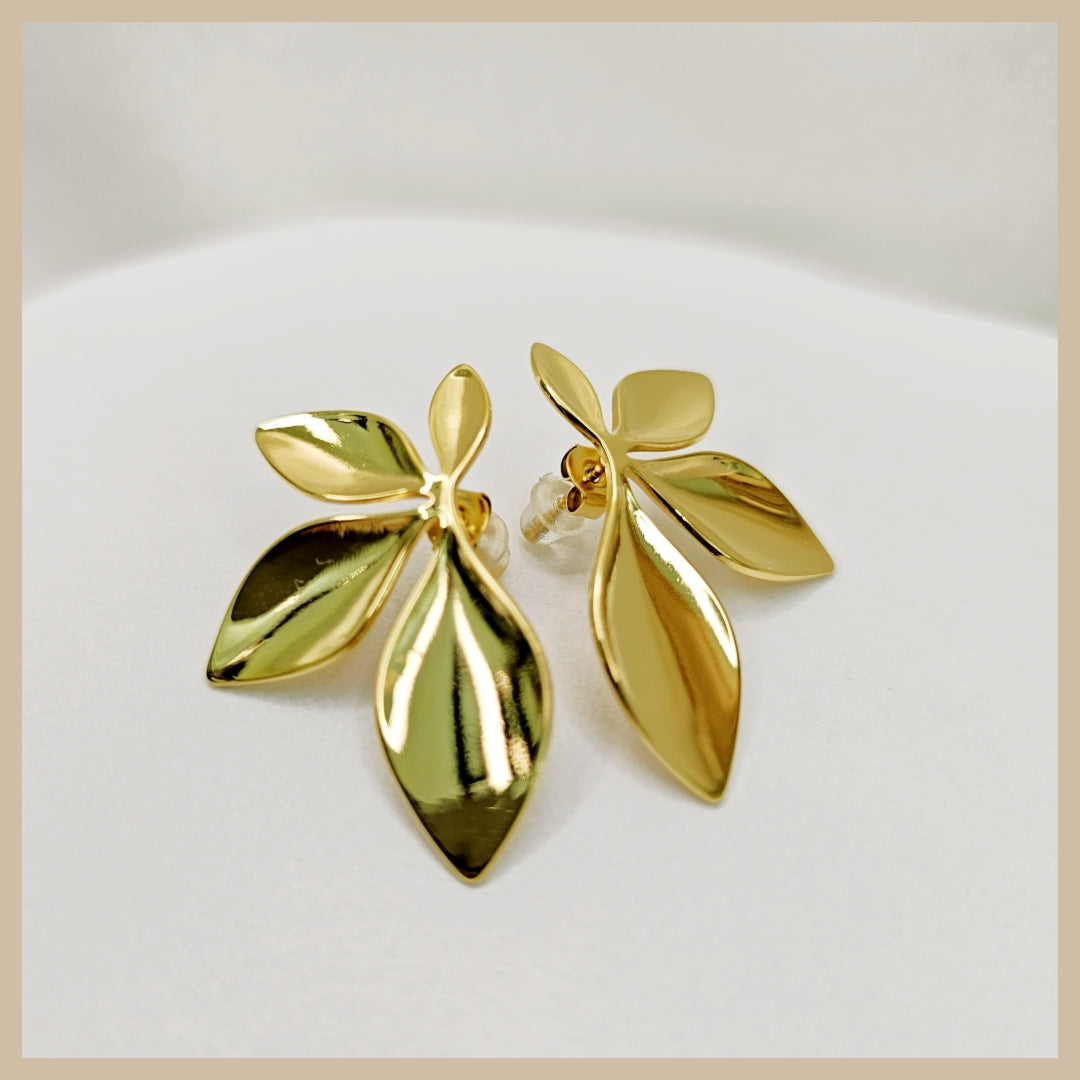 Korean-style Enna half flower earrings for women, designed with a delicate petal look that adds polished beauty and subtle sparkle to everyday outfits.