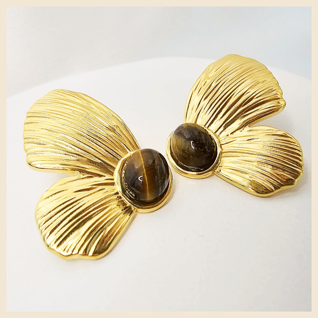 Leni floral butterfly hoop earrings in gold tone, designed to elevate simple looks with a chic, feminine finish that works from day to evening.