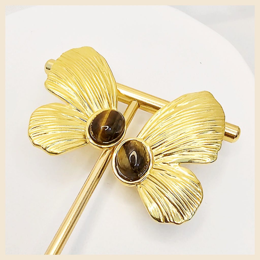 Leni gold-tone half butterfly earrings for women, a trendy casual-wear accessory that adds subtle charm and polished confidence to daily outfits.
