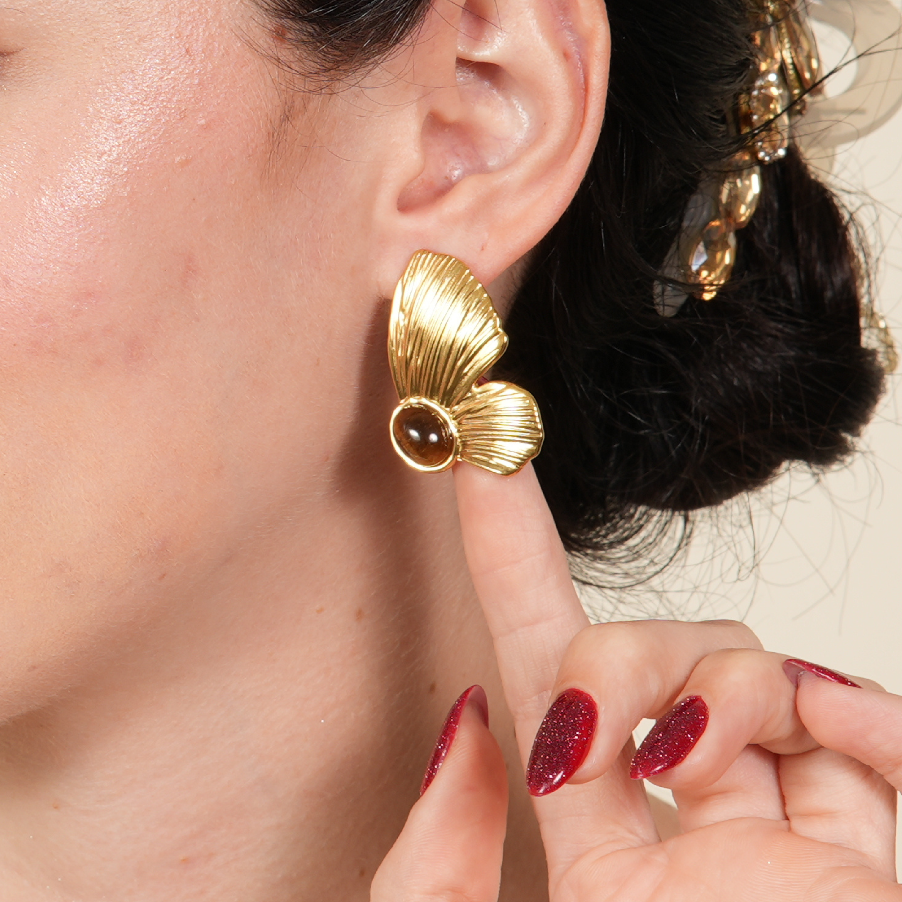 Leni half butterfly hoop earrings in a gold-tone minimalist design, created for women who want elegant everyday style with a soft, feminine glow.