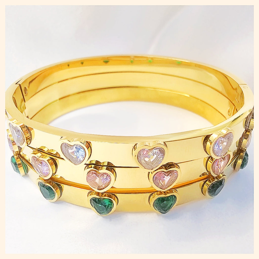 Lifestyle shot of gold bangle with CZ, perfect for daily wear in the UAE, capturing effortless style and quiet confidence on the wrist.