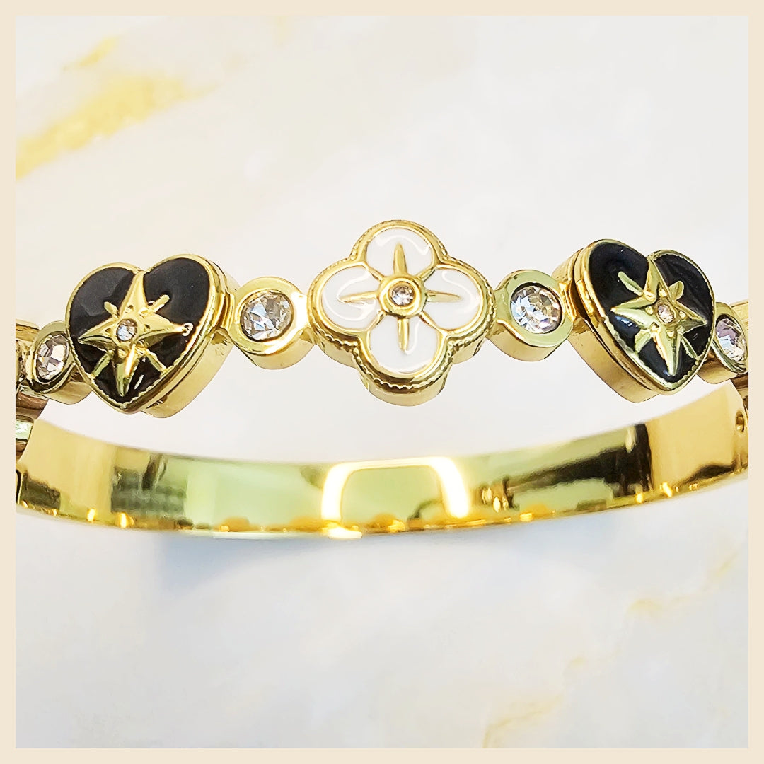 Gold heart and clover bracelet adjustable design ideal for women gifting