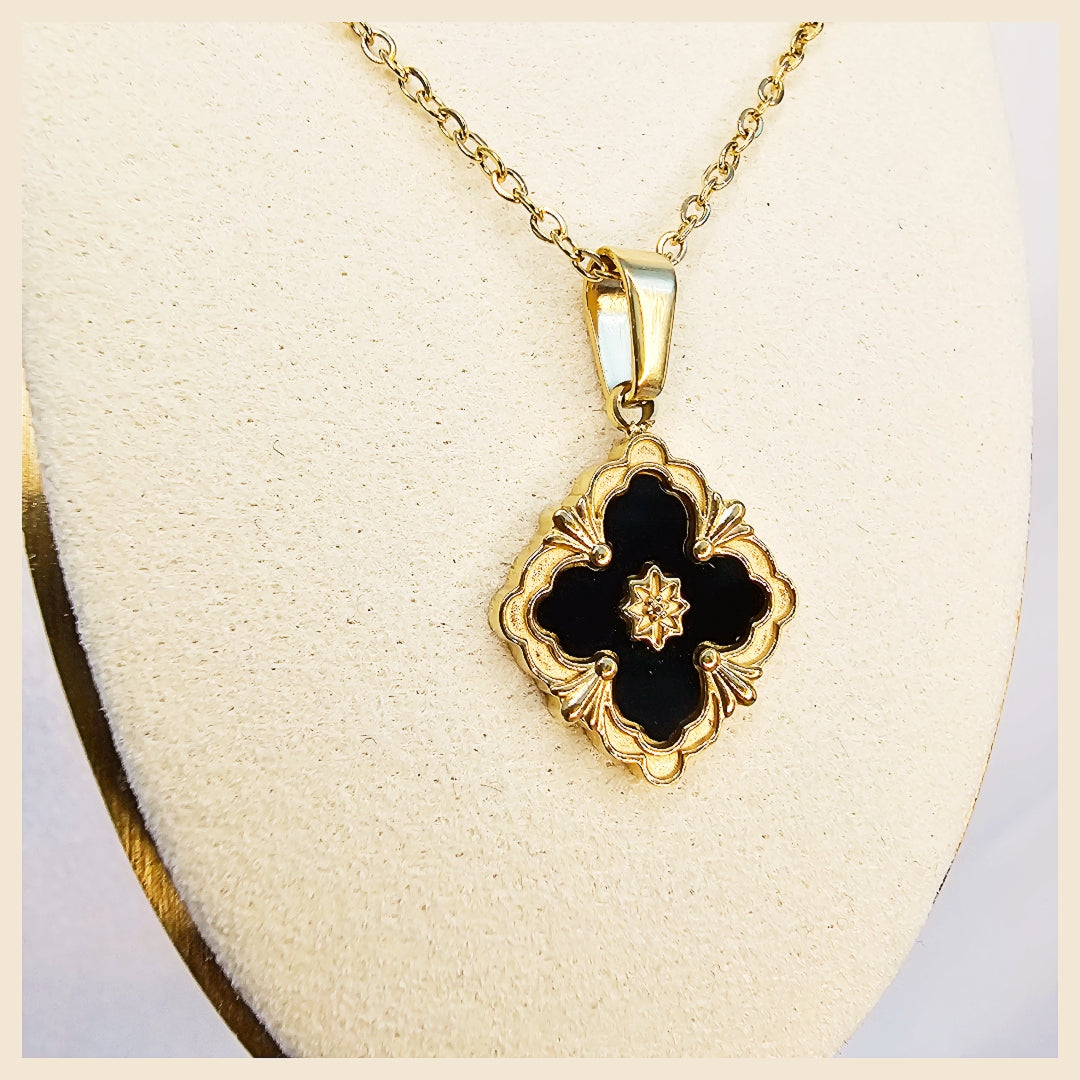 Lura black five-leaf clover necklace set in 18K gold-plated finish, perfect for Eid gifting or celebrating someone special with a timeless symbol of luck and love.