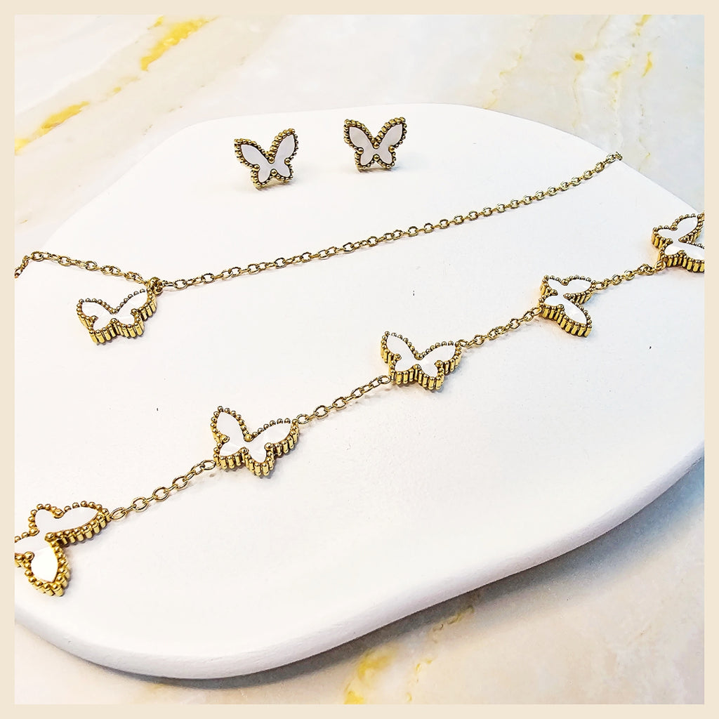 Luxury butterfly jewelry set in white gold, ideal for weddings and special occasions where elegance and sophistication matter.