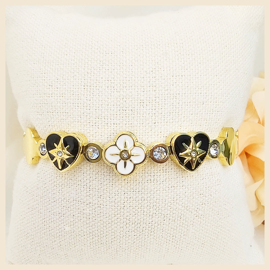 Gold heart and clover bracelet adjustable design ideal for women gifting