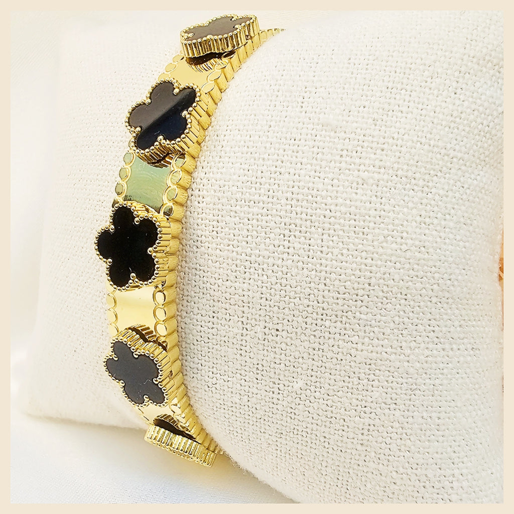 Luxury Keia petal clover bangle with crystal shine, gift-worthy and exclusive for women in the UAE who love premium jewellery with modern charm.