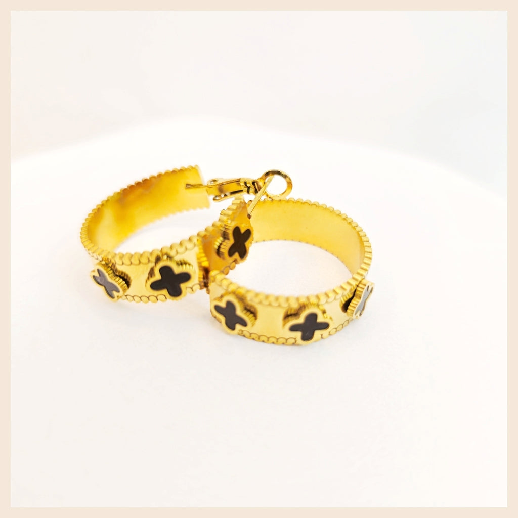 Minimalist Dana clover hoop earrings with refined crystal detailing, made for women who prefer subtle elegance and trusted quality in daily wear.
