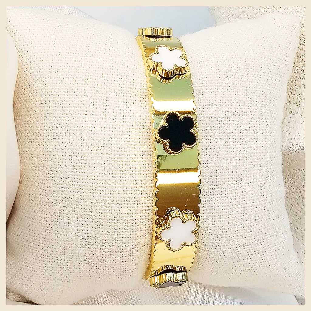 Modern Keia clover petal bangle with crystals in 18K gold-plated stainless steel, perfect for women who want daily luxury with lasting shine.