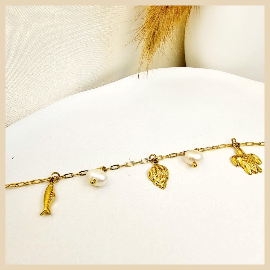 Premium Fray pearl slider bracelet in gold-plated finish, perfect for women seeking a delicate accessory that enhances confidence and modern style.
