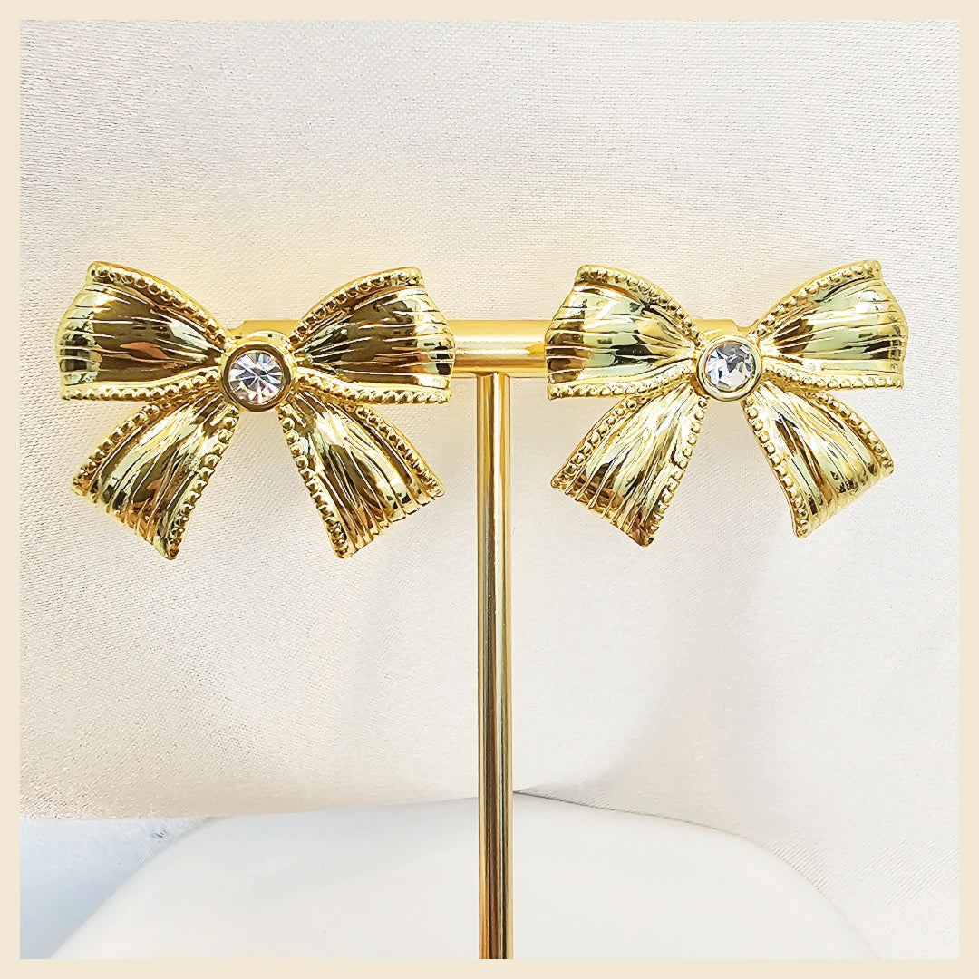 Premium Lala sparkling bow earrings with rhinestone-studded shine, ideal for women who want a luxury-look accessory that photographs beautifully at parties.