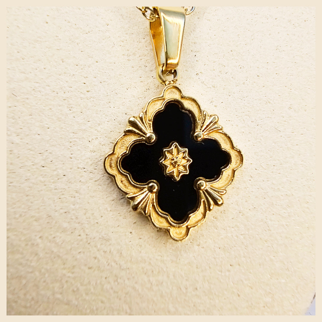 Premium Lura black clover pendant necklace and earrings set, a polished pairing that adds a sophisticated glow and makes everyday outfits feel effortlessly luxurious.