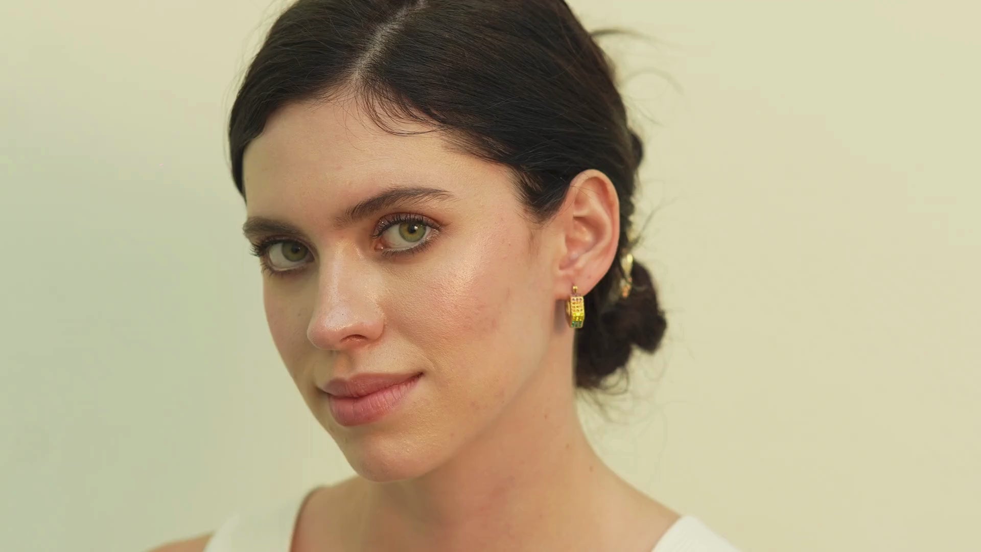 Modern Fana black enamel CZ hoop earrings, inspired by Dubai-style fashion for women who appreciate bold contrast with a feminine, polished glow.