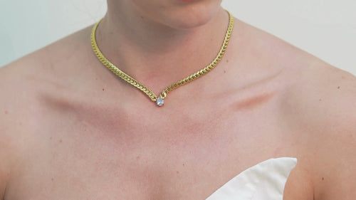 Amya blue cubic zirconia teardrop charm necklace, crafted to deliver a premium glow that enhances confidence and feminine elegance.