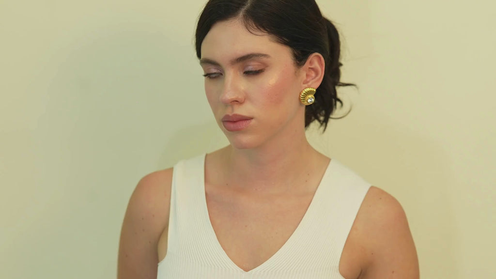 Ocean series Emil shell stud earrings, crafted in 18K gold-plated finish for women who love elegant details that feel refined, modern, and exclusive.