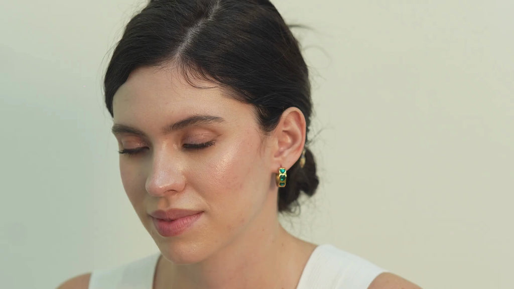 Bess green CZ hoop earrings for women with a pear-drop design, perfect for shoppers who want refined glamour and a premium jewellery feel.