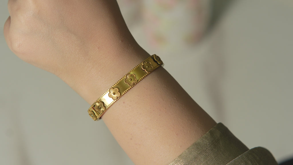 Luxury Kate Deep Petal Clover bangle with crystal accents, a gift-worthy piece for her that feels exclusive, feminine, and beautifully polished.