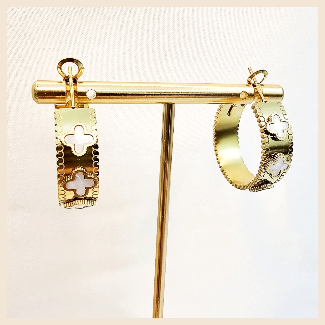 Romantic Dana four-leaf clover hoop earrings with heart zircon, an anniversary gift that symbolizes luck, love, and a beautiful lasting impression.